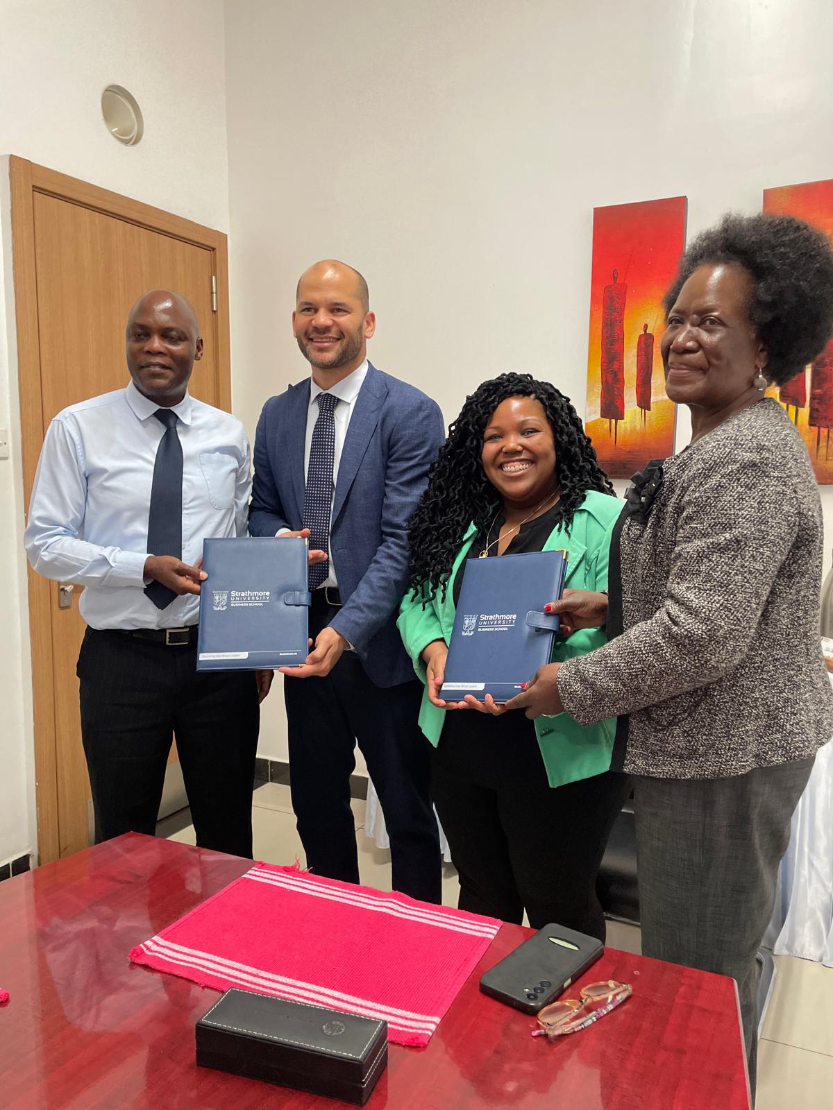 From Left: Cavin Opiyo - Grant Manager, Office of the Associate Dean, Research and Innovation, Strathmore University Business School, Chinezi Chijioke, Co-founder & CEO, Nova Pioneer, Dr. London Moore, Senior Director of Schools, Nova Pioneer, Rosemary Okello-Orlale, Director of Africa Media Hub at Strathmore University Business School following the signing of the MoU to advance AI Education in Africa.