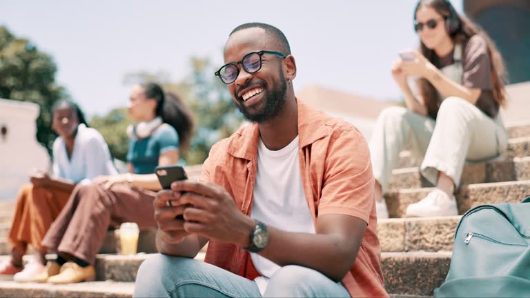 black university student on phone