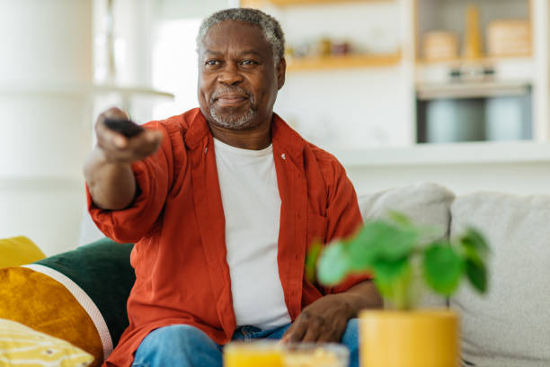 black man watching tv