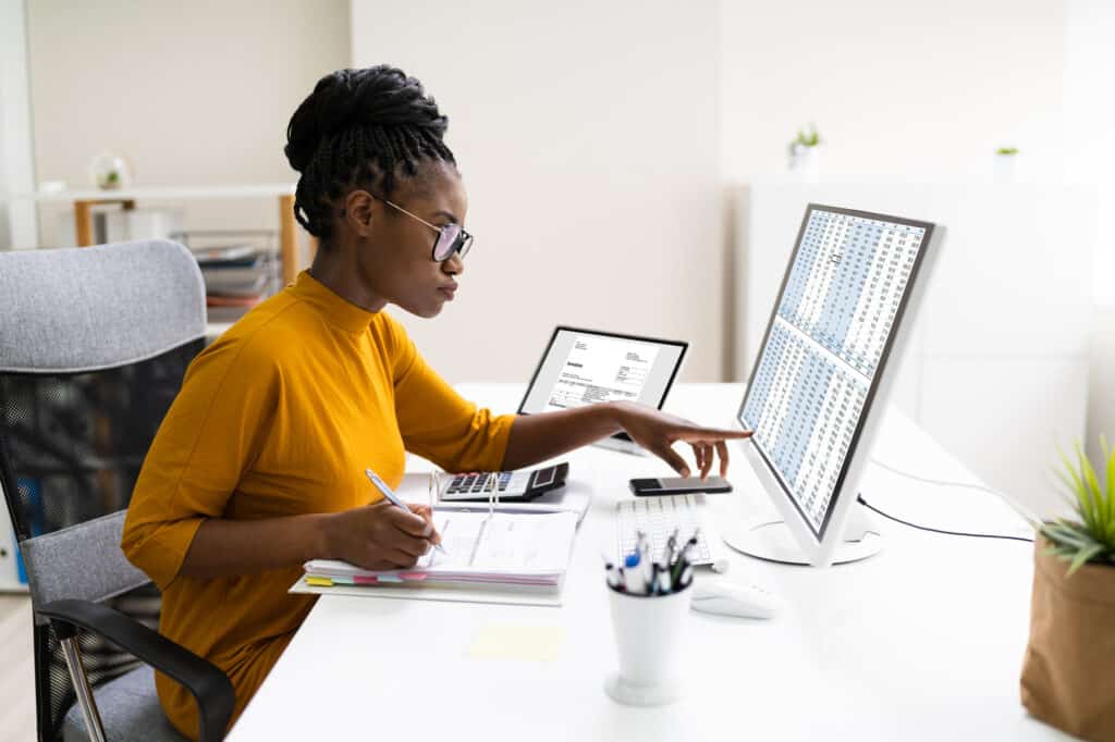 Kenyan Woman Accountant on computer