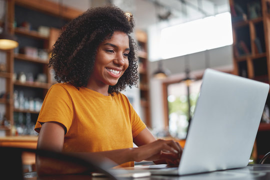 kenyan woman using laptop