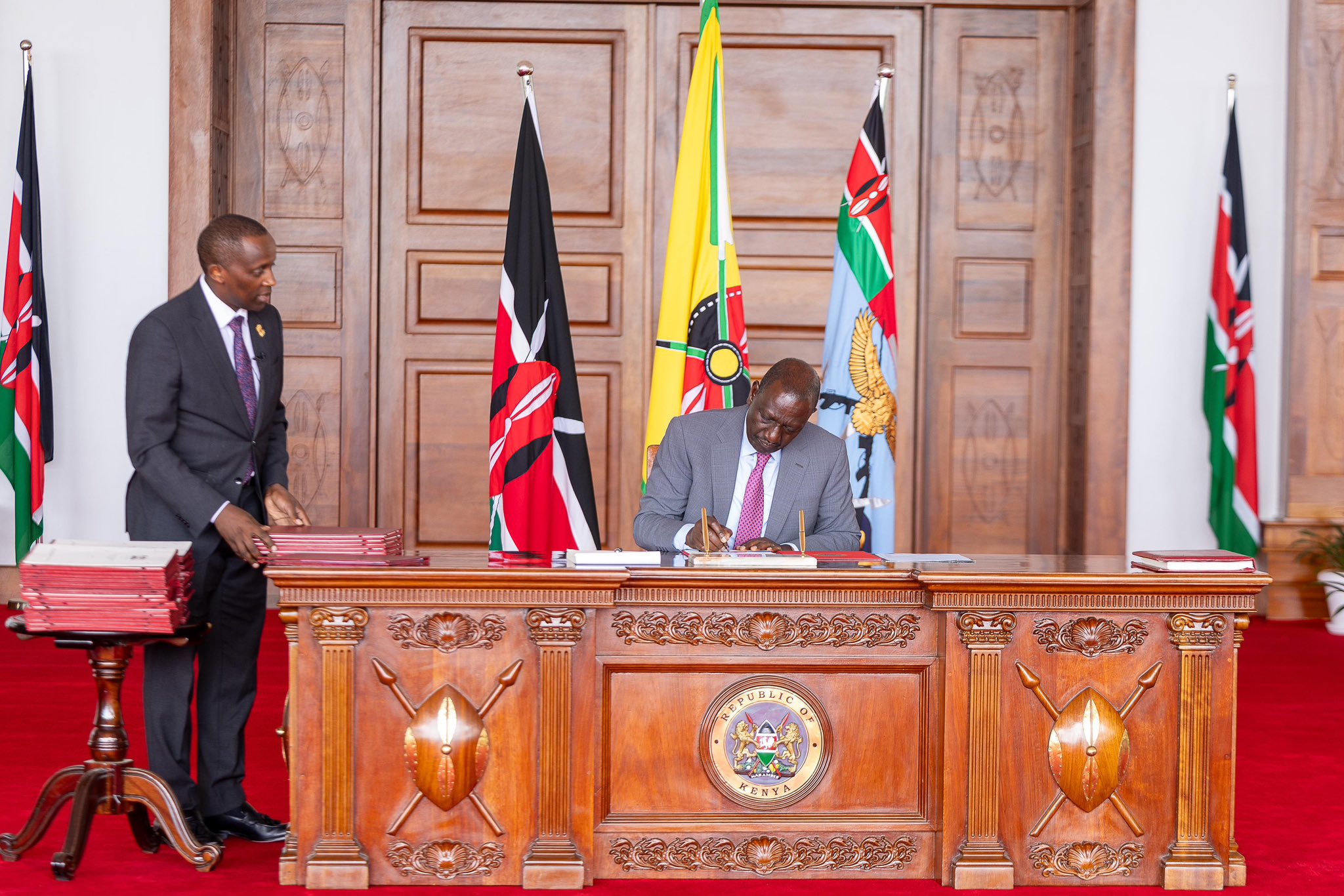 Ruto signs bills