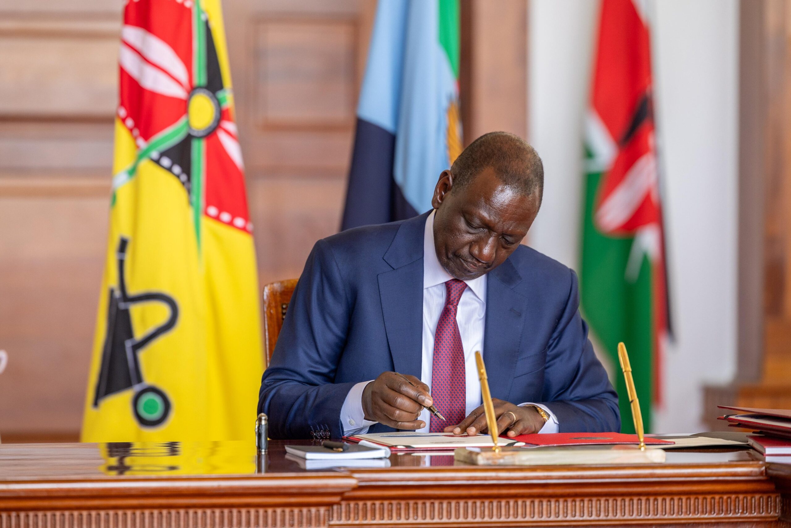 Ruto Signs