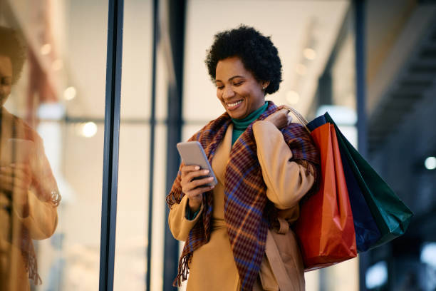 woman paying using phone