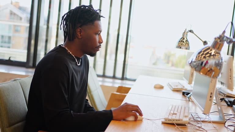 man using laptop