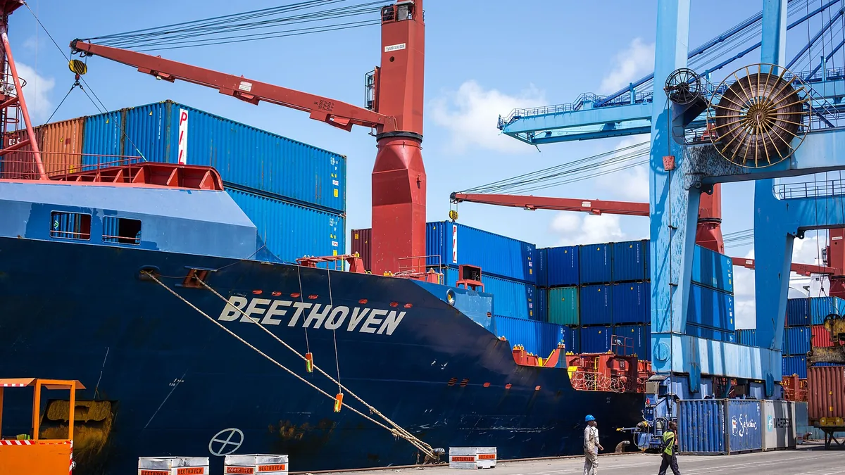 A ship berthed under gantry cranes at the Port of Mombasa