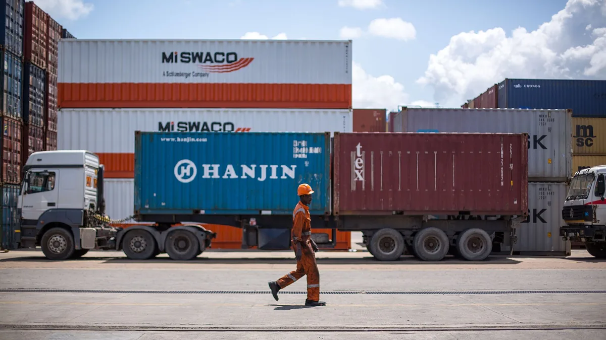 A truck hauls containers through the Port of Mombasa