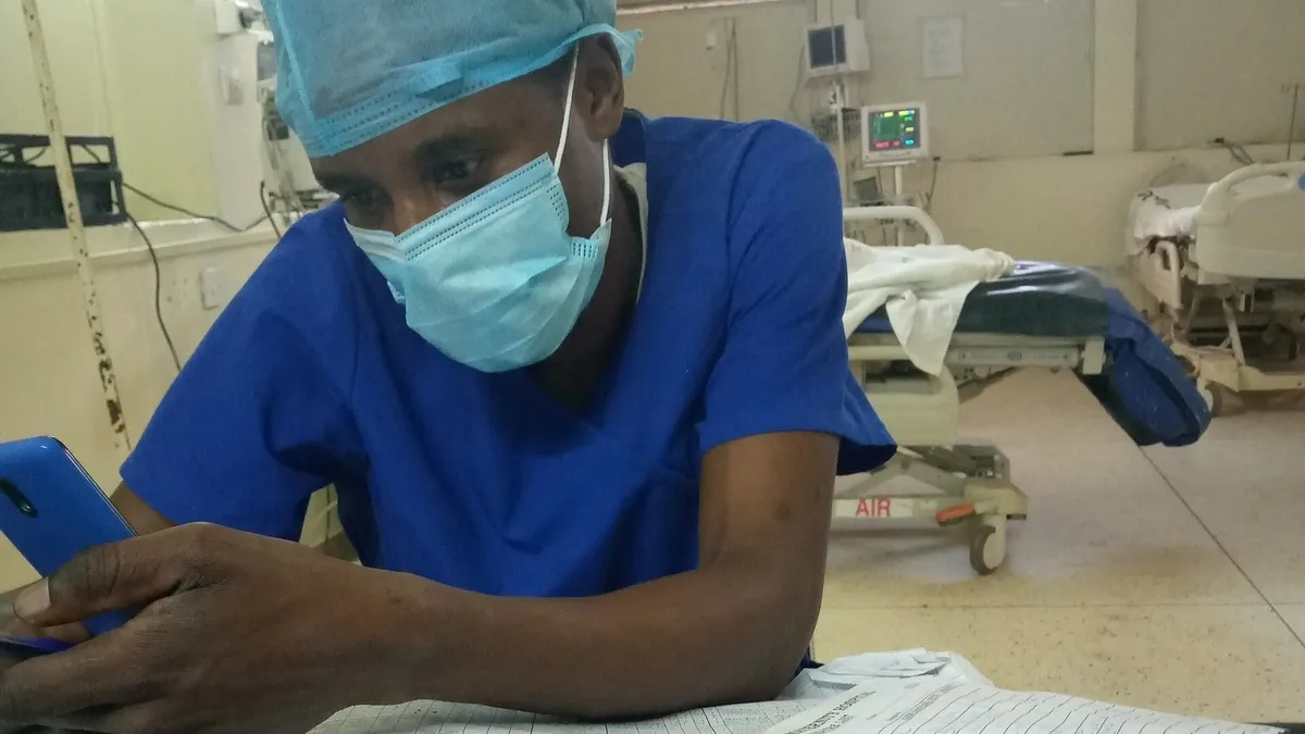 Doctor at Pumwani Maternity Hospital, Nairobi – illustrating blood transfusion centres in kenya