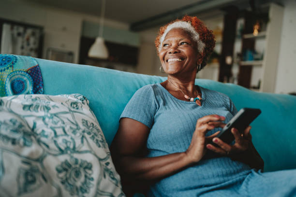 elderly woman using phone