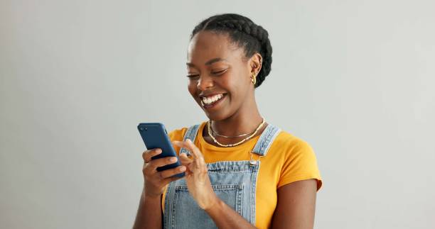 excited woman holding phone