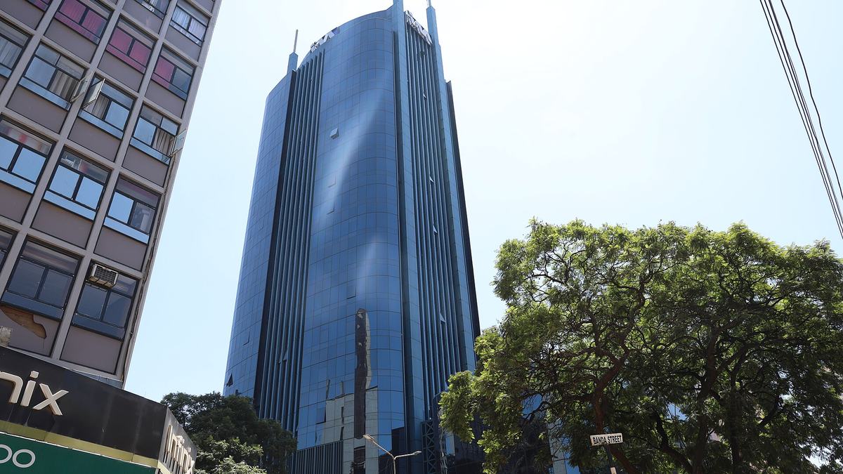 I&M Bank Tower, a glass office tower in Nairobi, seen from street level