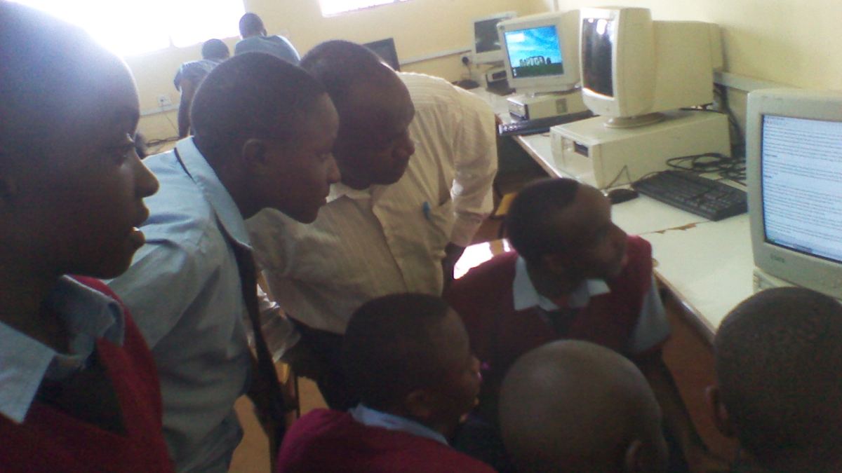 Students at a Kenyan high school working on computers