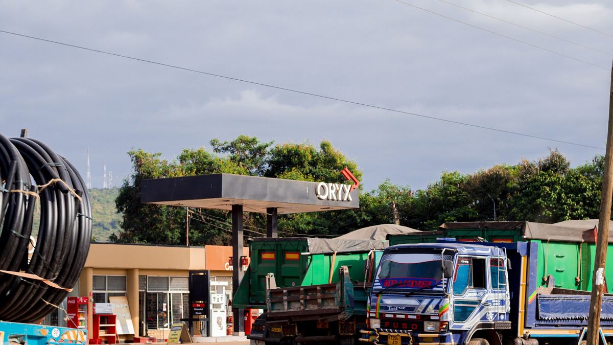 Oryx-branded fuel station with parked trucks in Tanzania
