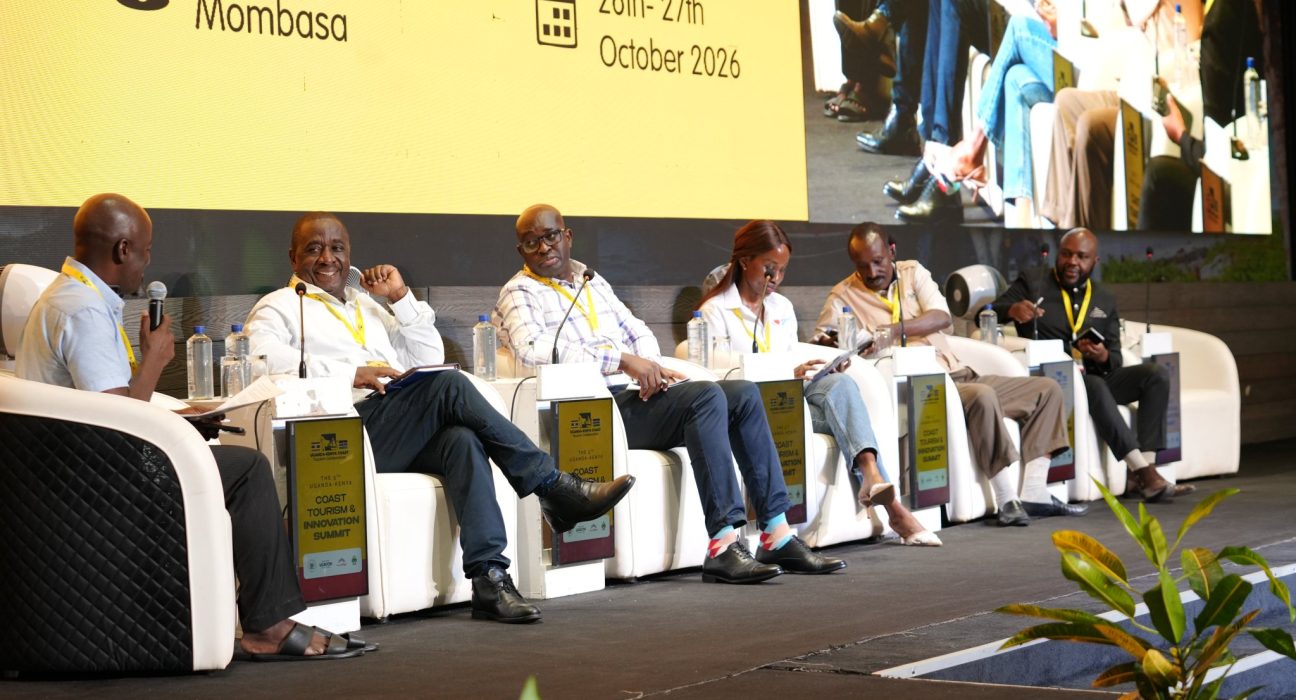 Panel of speakers on stage at the Uganda–Kenya Coast Tourism and Innovation Summit, Sarova Whitesands, Mombasa, October 2026